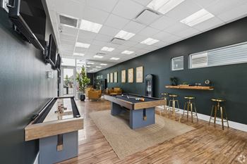 Entertainment lounge with billiards and bar seating